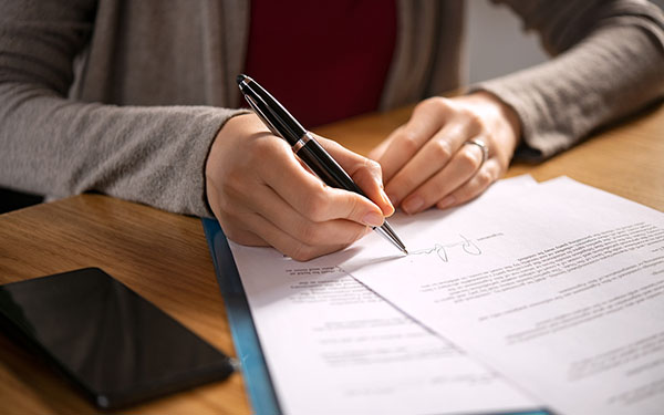 Signing under the Companies Act 2006
