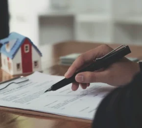 Professional Female Real Estate Signing