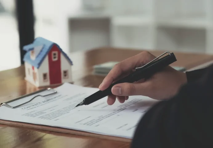 Professional Female Real Estate Signing